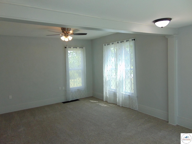 311 N Water St, Clinton, MO 64735 - carpeted empty room featuring a ceiling fan and baseboards