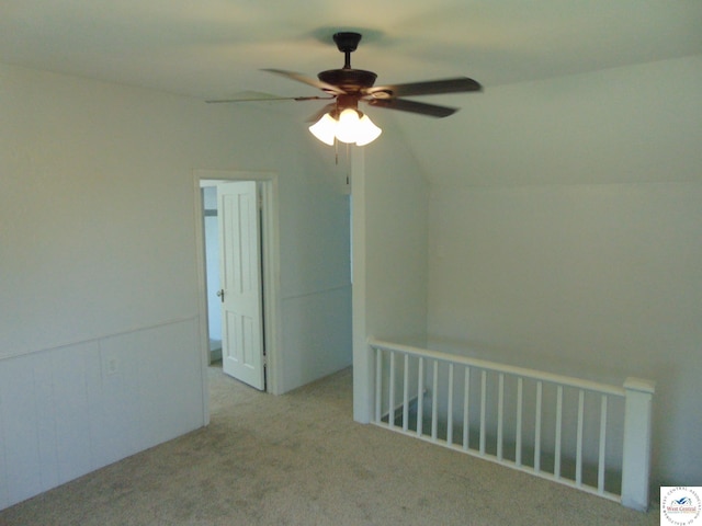 311 N Water St, Clinton, MO 64735 - unfurnished room featuring ceiling fan, carpet flooring, and vaulted ceiling