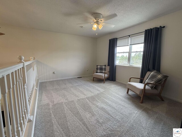 225 Crescent Dr, Lincoln, MO 65338 - unfurnished room featuring a ceiling fan, a textured ceiling, and carpet floors