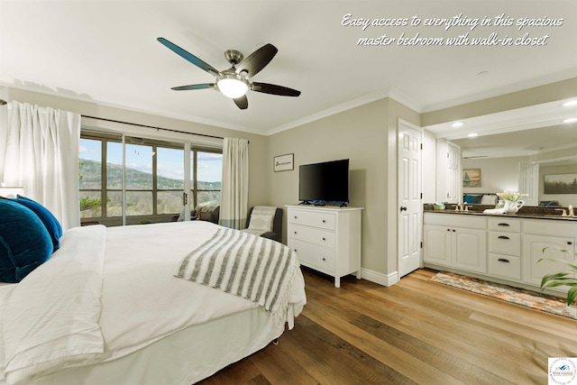 bedroom with recessed lighting, wood finished floors, access to outside, baseboards, and crown molding
