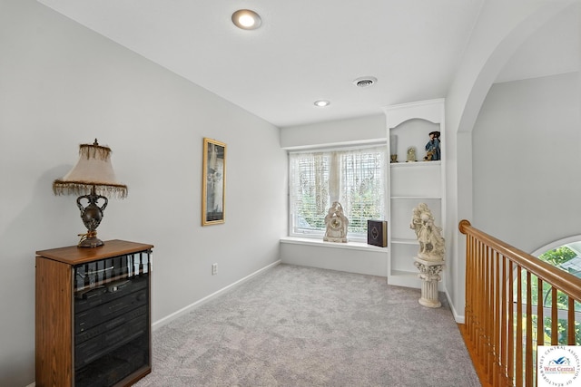 414 S Borgman Rd, Buckner, MO 64016 - carpeted bedroom featuring multiple windows, arched walkways, and recessed lighting