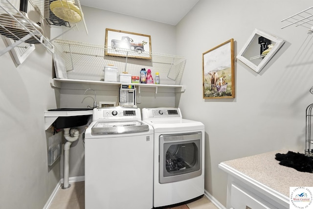 414 S Borgman Rd, Buckner, MO 64016 - laundry room featuring separate washer and dryer and light tile patterned floors