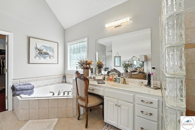 414 S Borgman Rd, Buckner, MO 64016 - bathroom with tile patterned floors, a garden tub, vanity, and vaulted ceiling