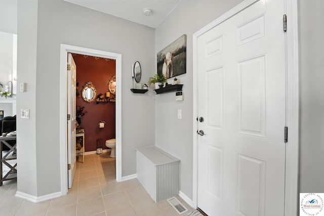 414 S Borgman Rd, Buckner, MO 64016 - mudroom featuring baseboards and light tile patterned floors