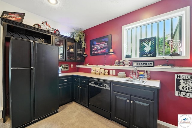 414 S Borgman Rd, Buckner, MO 64016 - kitchen featuring black appliances, light carpet, glass insert cabinets, and light countertops