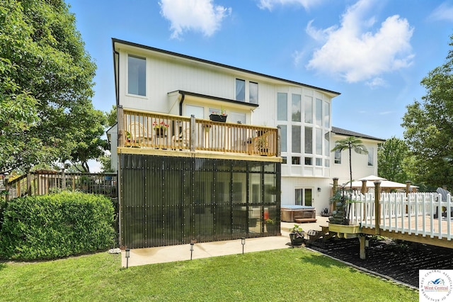 414 S Borgman Rd, Buckner, MO 64016 - rear view of property featuring a hot tub, a deck, and a lawn