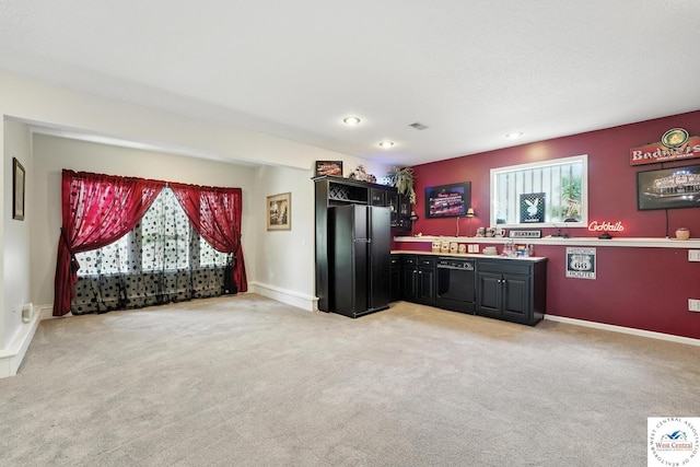 414 S Borgman Rd, Buckner, MO 64016 - kitchen with black appliances, light carpet, light countertops, and recessed lighting