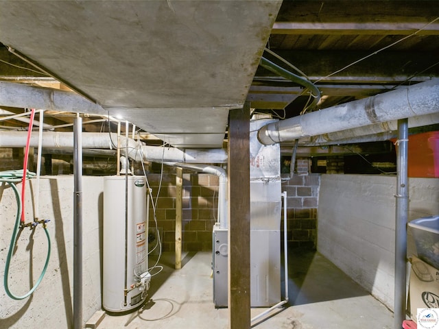 1407 E Main St, Higginsville, MO 64037 - unfinished below grade area featuring gas water heater and heating unit