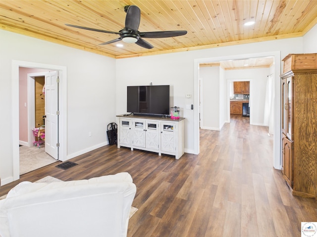 1407 E Main St, Higginsville, MO 64037 - living area featuring wood ceiling, wood finished floors, ceiling fan, baseboards, and recessed lighting