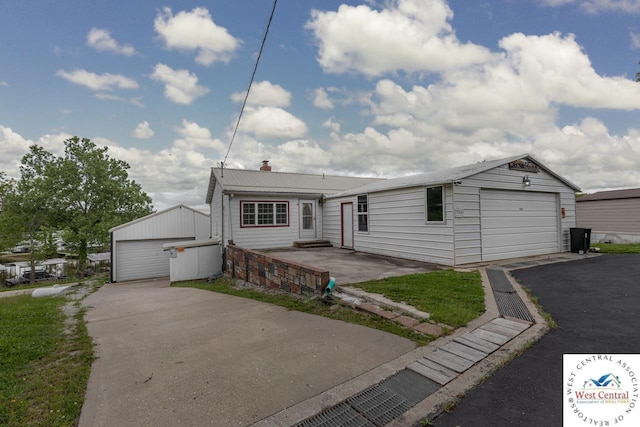 29686 Lake Road 57 Rd, Warsaw, MO 65355 - single story home with asphalt driveway and an outdoor structure