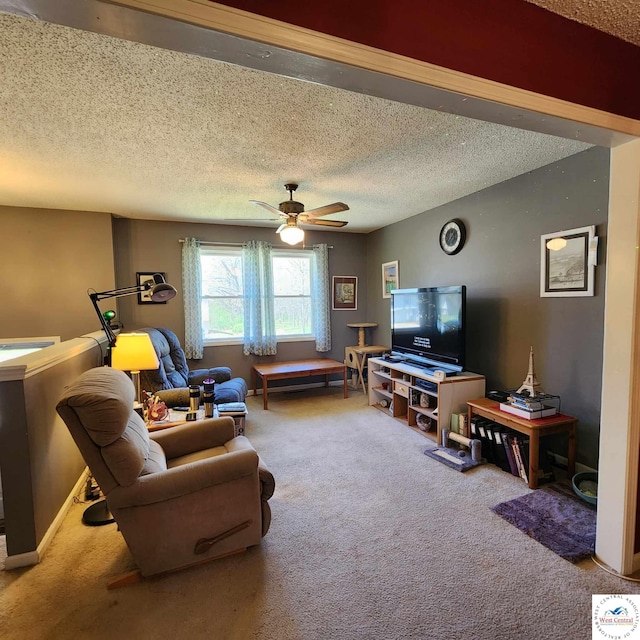2206 N Swisher Dr, Clinton, MO 64735 - living area with a textured ceiling, a ceiling fan, and carpet flooring