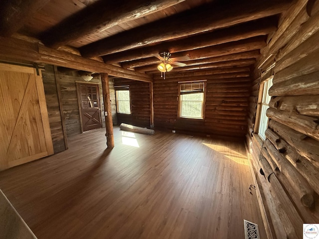 25956 S 7th Hwy, Warsaw, MO 65355 - unfurnished living room with wooden ceiling, wood finished floors, beam ceiling, a ceiling fan, and log walls