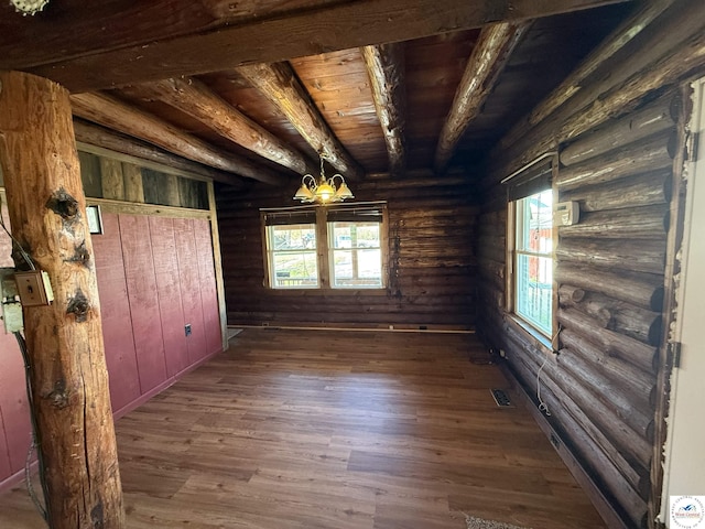 25956 S 7th Hwy, Warsaw, MO 65355 - interior space featuring wooden ceiling, wood finished floors, an inviting chandelier, visible vents, and log walls