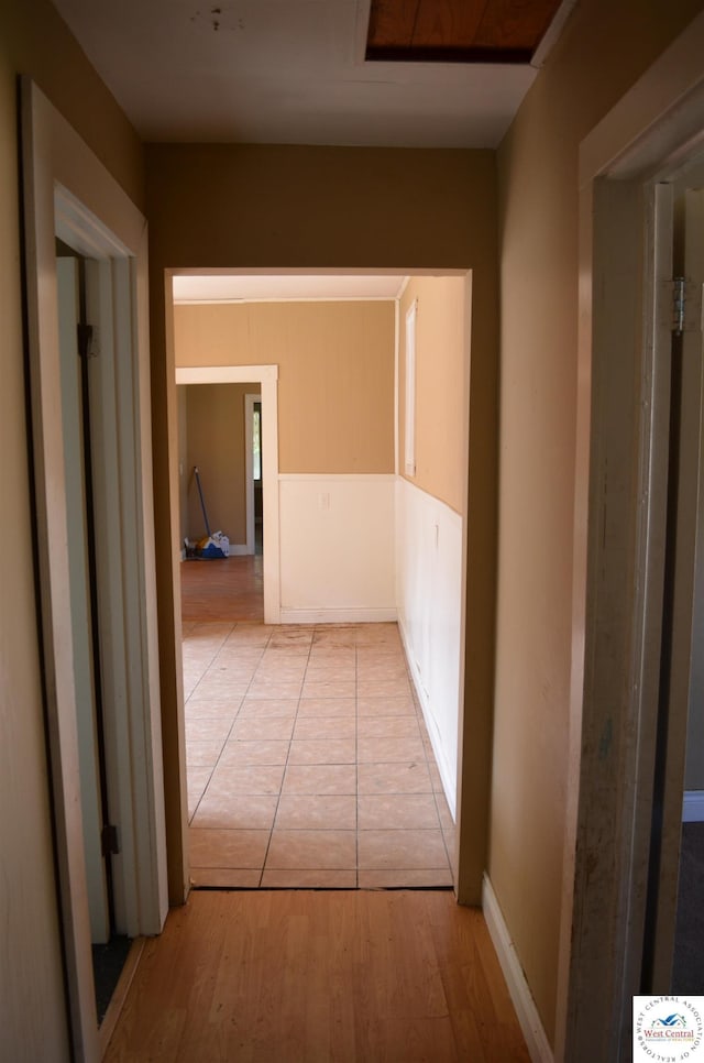 1305 E 14th St, Sedalia, MO 65301 - hallway featuring light wood-type flooring