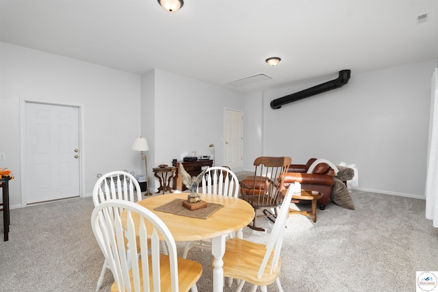 1114 W Broadway Blvd, Sedalia, MO 65301 - carpeted dining space with baseboards and visible vents