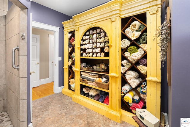 wine area featuring stone finish floor