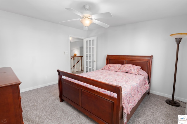1114 W Broadway Blvd, Sedalia, MO 65301 - bedroom featuring ceiling fan, light colored carpet, and baseboards