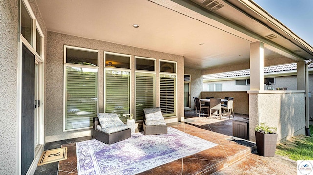 4517 NE Fairway Homes Dr, Lees Summit, MO 64064 - view of patio / terrace with outdoor dining area