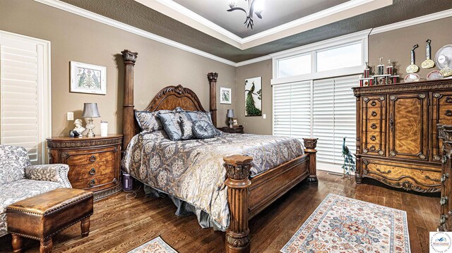 4517 NE Fairway Homes Dr, Lees Summit, MO 64064 - bedroom featuring a raised ceiling, hardwood / wood-style flooring, and ornamental molding