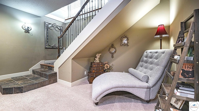 4517 NE Fairway Homes Dr, Lees Summit, MO 64064 - sitting room with carpet floors, a skylight, and stairway