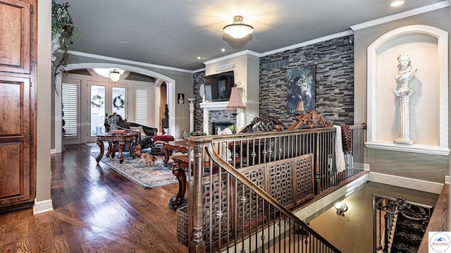 4517 NE Fairway Homes Dr, Lees Summit, MO 64064 - interior space featuring arched walkways, wood finished floors, ornamental molding, and recessed lighting