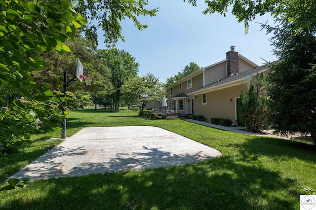 2105 Stonewood Cir, Sedalia, MO 65301 - view of green lawn featuring a patio