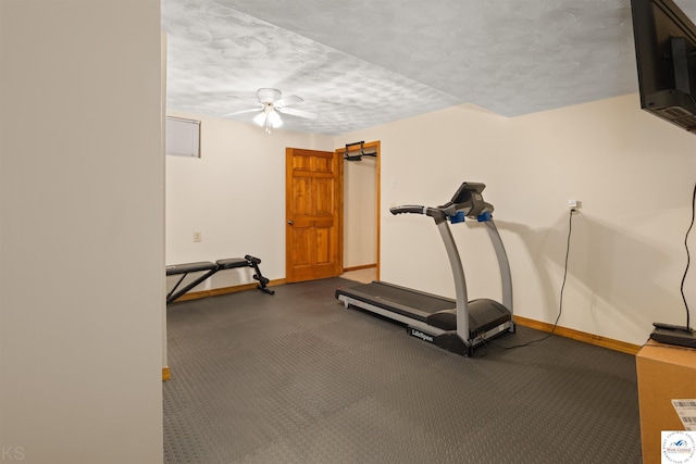 2105 Stonewood Cir, Sedalia, MO 65301 - workout room with a ceiling fan and a textured ceiling