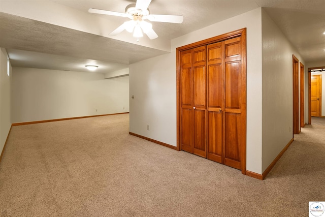 2105 Stonewood Cir, Sedalia, MO 65301 - below grade area featuring light colored carpet and a ceiling fan