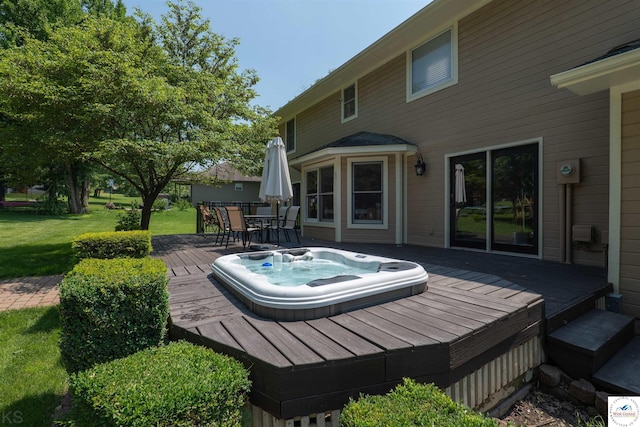 2105 Stonewood Cir, Sedalia, MO 65301 - wooden terrace featuring outdoor dining space and a lawn