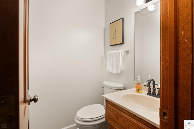 2105 Stonewood Cir, Sedalia, MO 65301 - bathroom with toilet and vanity