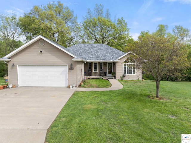 ranch-style home featuring covered porch, concrete driveway, an attached garage, a front yard, and roof with shingles