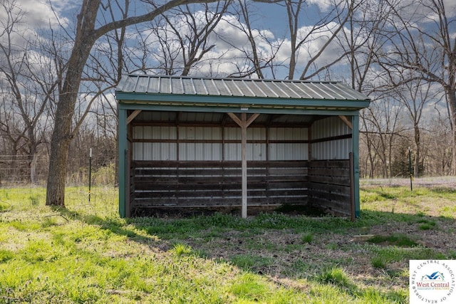 24401 Black Hawk Trl, Cole Camp, MO 65325 - view of pole building featuring a carport