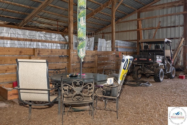 24401 Black Hawk Trl, Cole Camp, MO 65325 - garage featuring metal wall