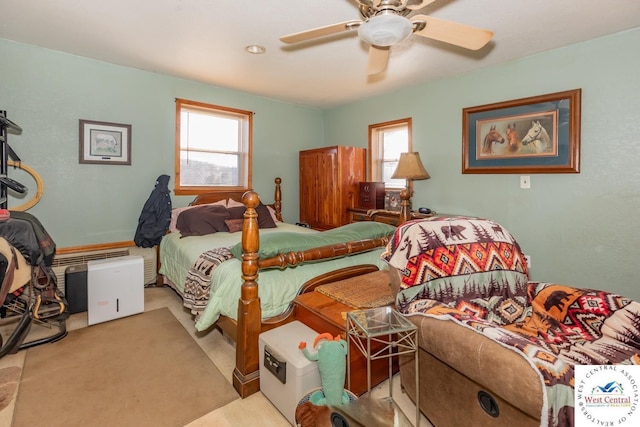 24401 Black Hawk Trl, Cole Camp, MO 65325 - bedroom featuring multiple windows and a ceiling fan