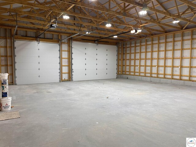 28927 Benton House Ave, Warsaw, MO 65355 - garage featuring a garage door opener