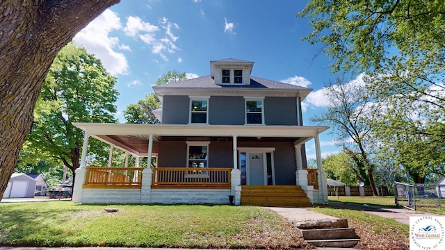 401 N Prospect St, Sedalia, MO 65301 - view of front of property featuring brick siding and a porch
