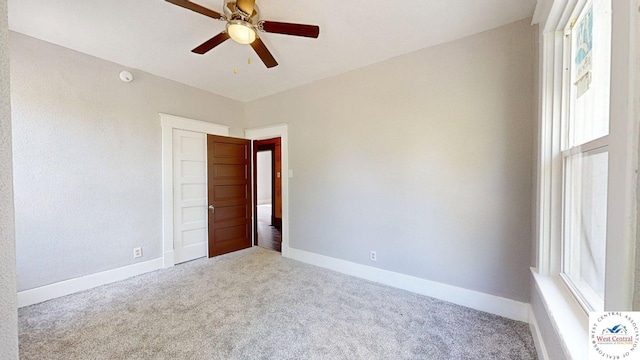 401 N Prospect St, Sedalia, MO 65301 - carpeted empty room featuring ceiling fan and baseboards