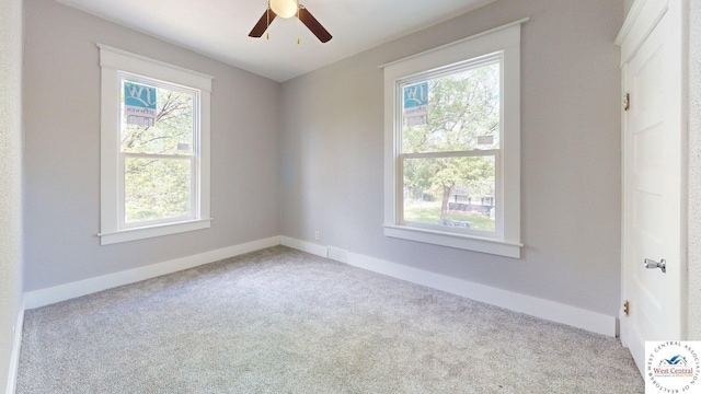 401 N Prospect St, Sedalia, MO 65301 - carpeted spare room with ceiling fan and baseboards