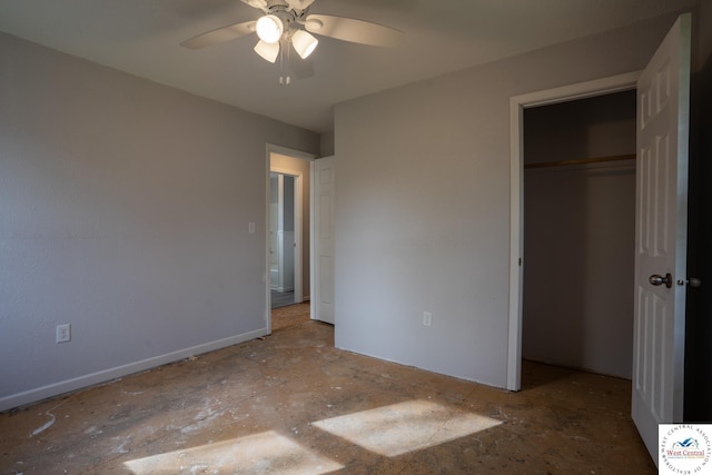 unfurnished bedroom with ceiling fan and a closet