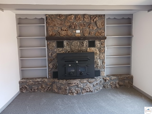 607 N Hughes St, Stover, MO 65078 - unfurnished living room featuring built in features, carpet, and baseboards