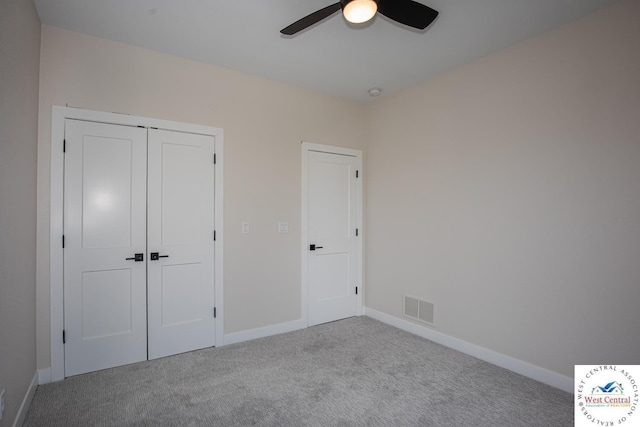 26112 Georgetown Ave, Warsaw, MO 65355 - unfurnished bedroom with baseboards, visible vents, and carpet flooring