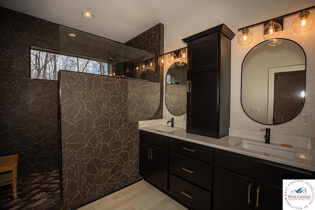 26112 Georgetown Ave, Warsaw, MO 65355 - bathroom featuring walk in shower, wood finished floors, and a sink
