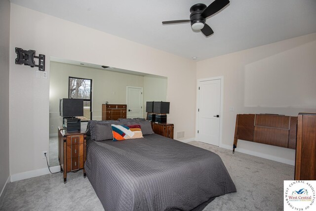 26112 Georgetown Ave, Warsaw, MO 65355 - carpeted bedroom with baseboards, visible vents, and ceiling fan