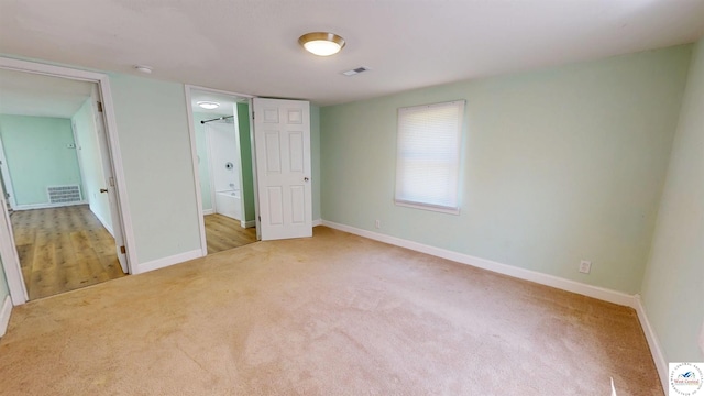 400 E 12th St, Sedalia, MO 65301 - unfurnished bedroom with carpet and baseboards