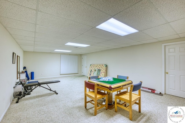 recreation room with carpet flooring and a drop ceiling