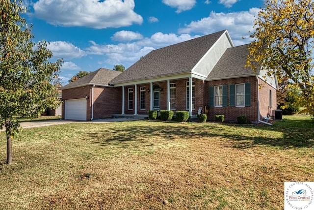 view of front of property with roof with shingles, covered porch, an attached garage, central AC, and brick siding