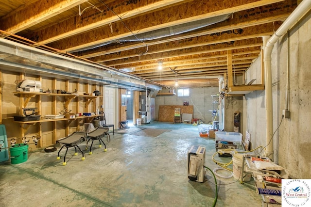 below grade area featuring heating unit