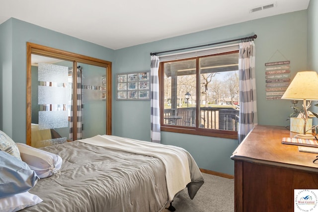 1436 Cherokee Rd, Lake Ozark, MO 65049 - carpeted bedroom featuring visible vents and baseboards