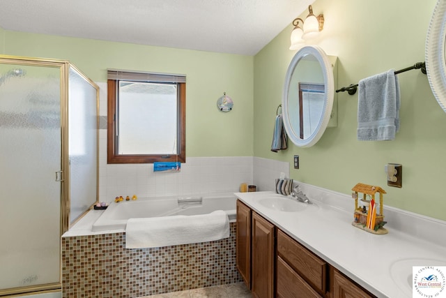 1436 Cherokee Rd, Lake Ozark, MO 65049 - bathroom featuring a stall shower, double vanity, a bath, and a sink