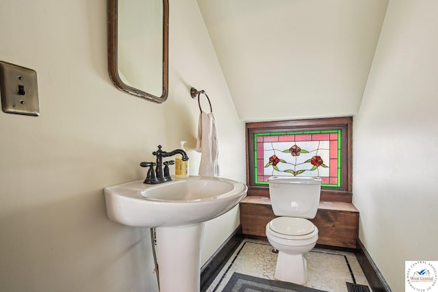 309 E Gay St, Warrensburg, MO 64093 - half bath featuring toilet and baseboards
